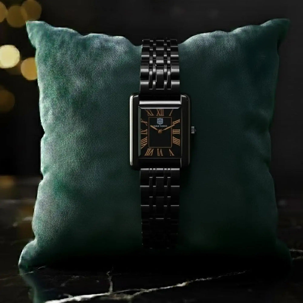 TOWER TORRE black rectangular wristwatch with Roman numerals on green pillow, luxury watch SEO