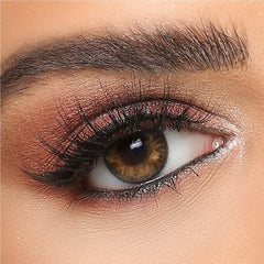 Pure Hazel colored contact lens on brown eye closeup with makeup, The Manay beauty product