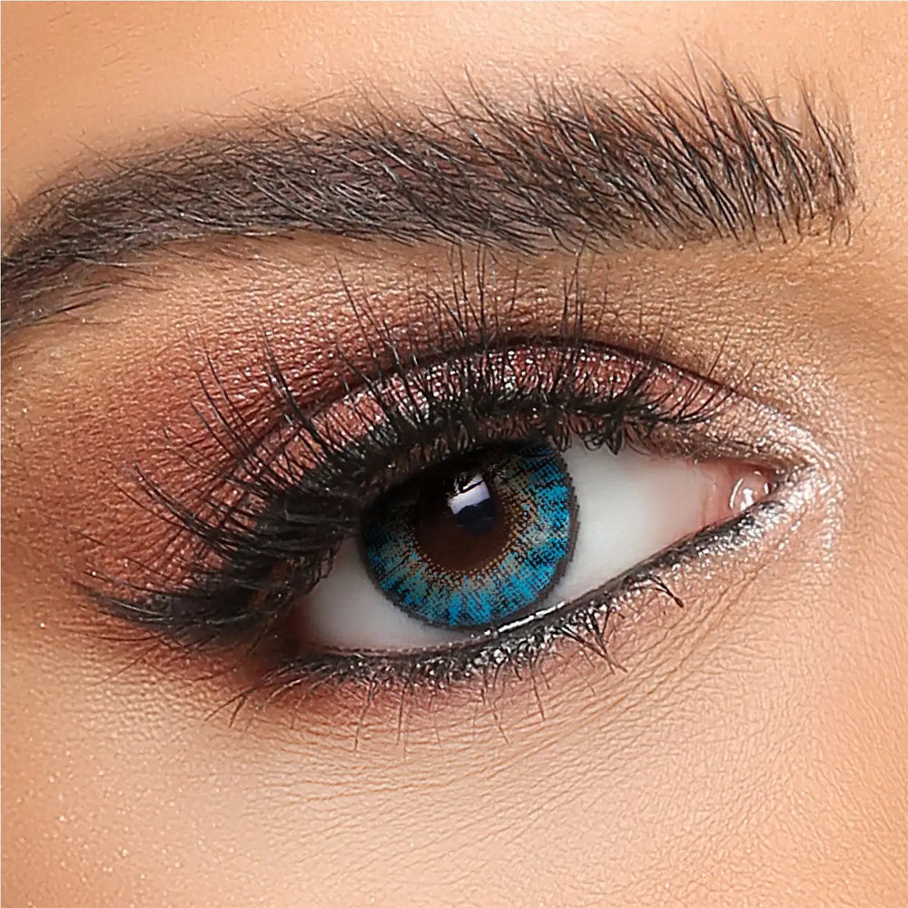 Turquoise blue cosmetic contact lens on brown eye, natural makeup, Buy Contacts Online