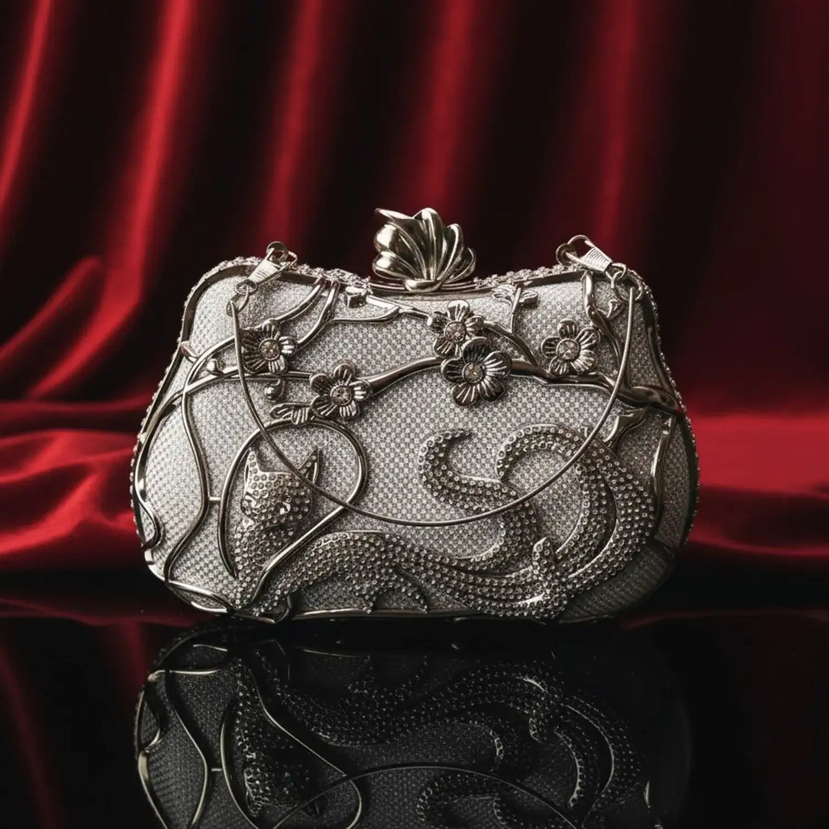 Luxury silver clutch bag with floral and cat design on red velvet, The Manay fashion