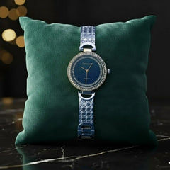 Luxury Dogalees watch with crystal bezel on green cushion, The Manay jewelry accessory